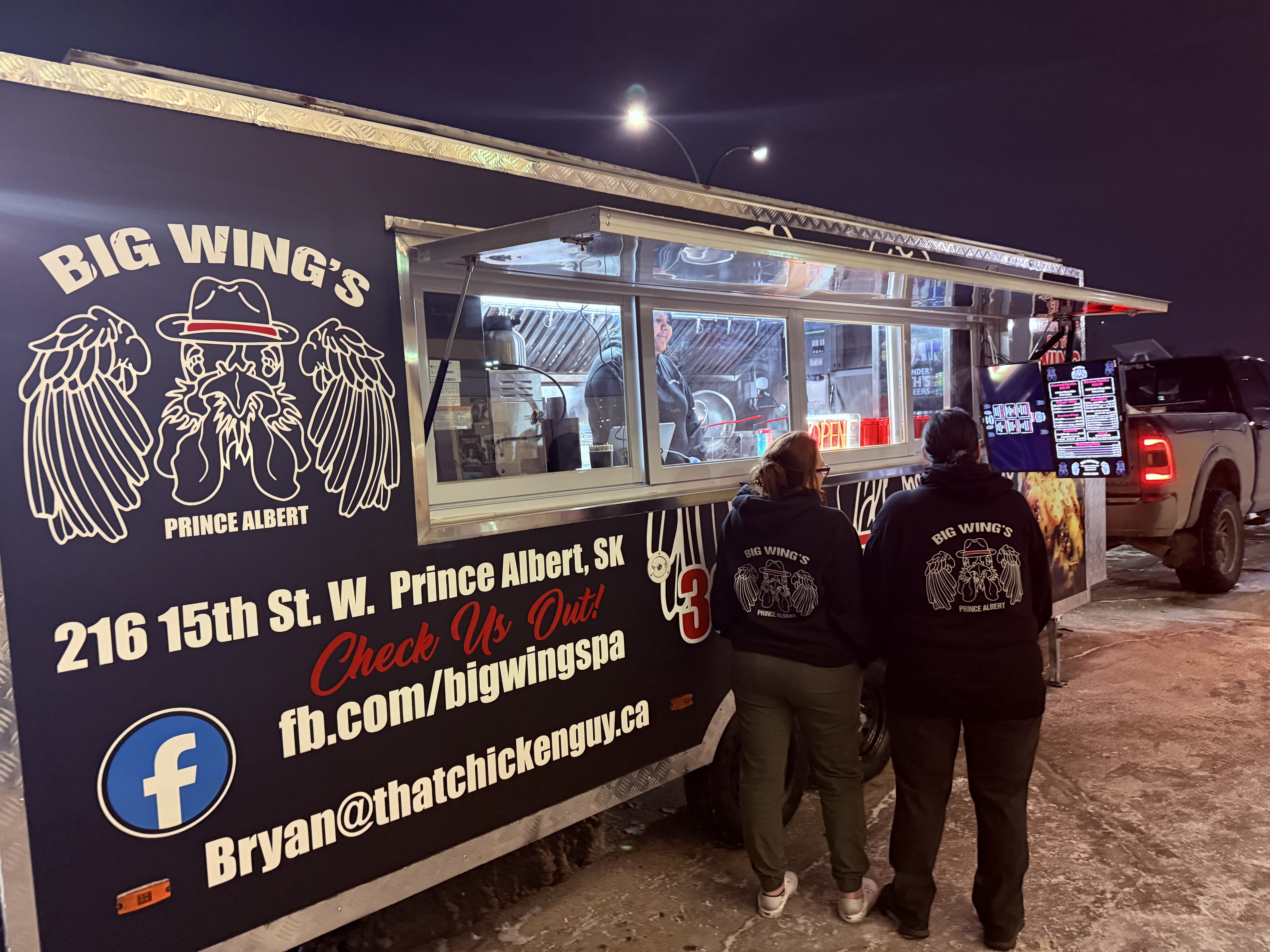 Big Wing's Mobile order window at night